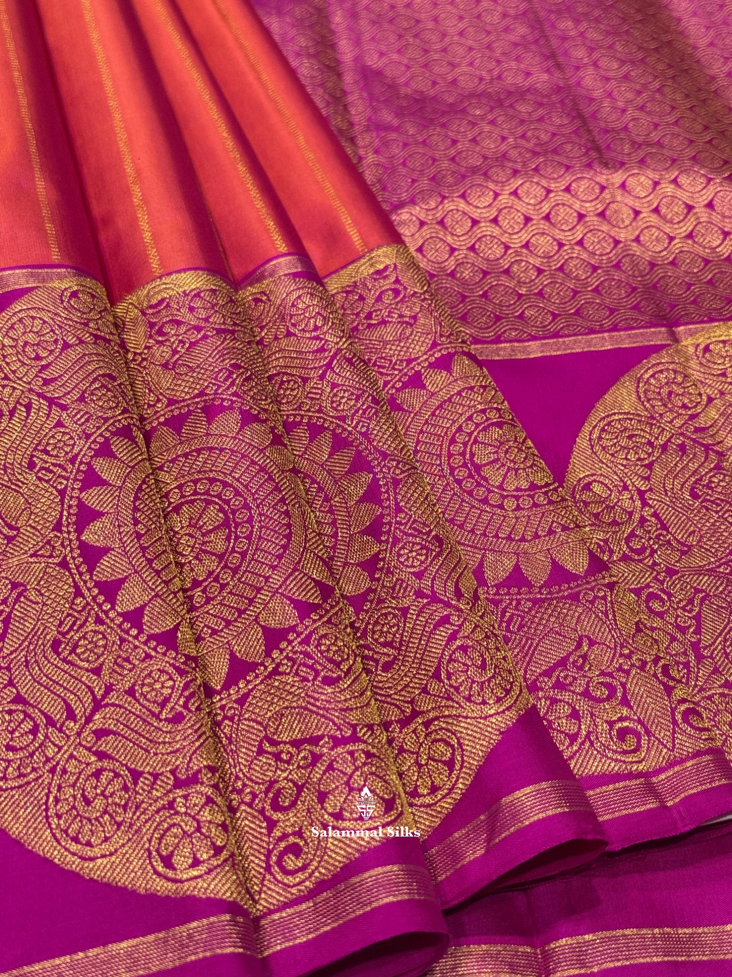 Kanjivaram Pinkish Orange Pure Silk Saree With Violet Big Butta Border