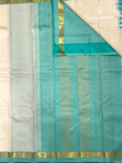 Kanjivaram Half White Silk Saree With Teal Border