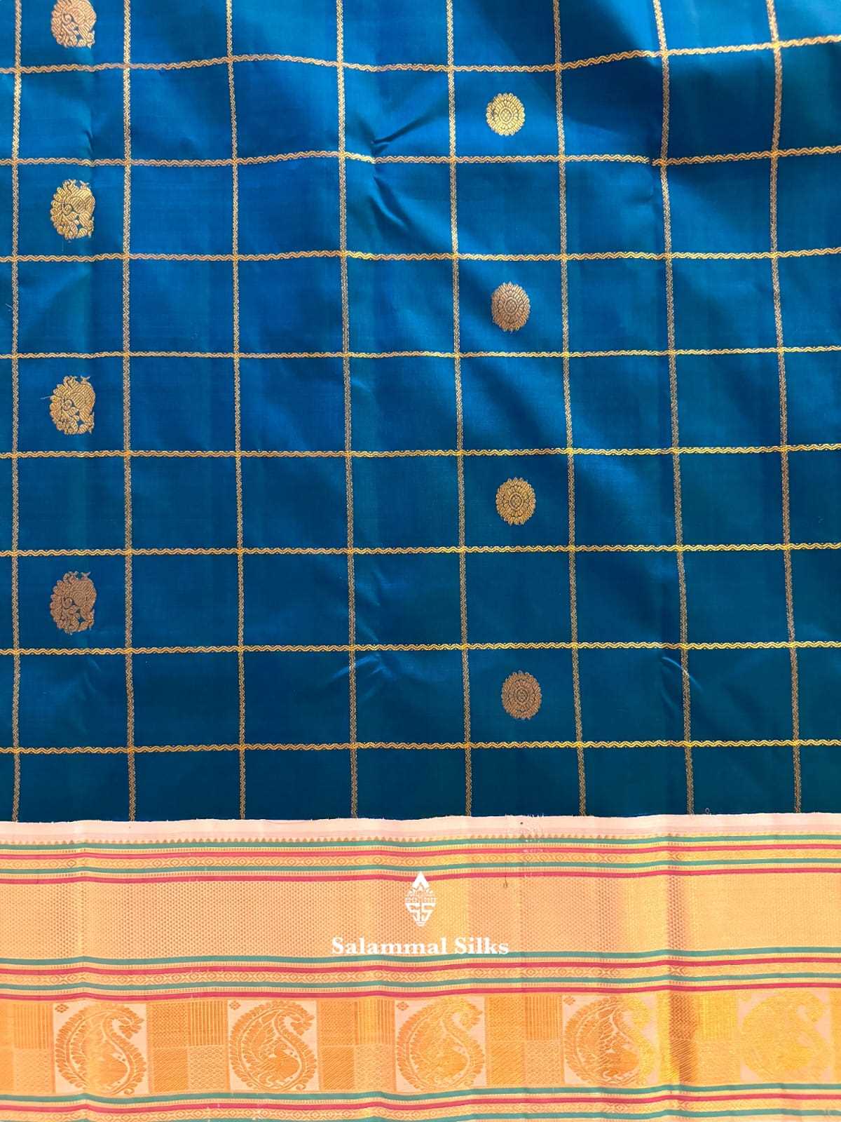 Kanjivaram Peacock Blue Silk Saree With Half White Border