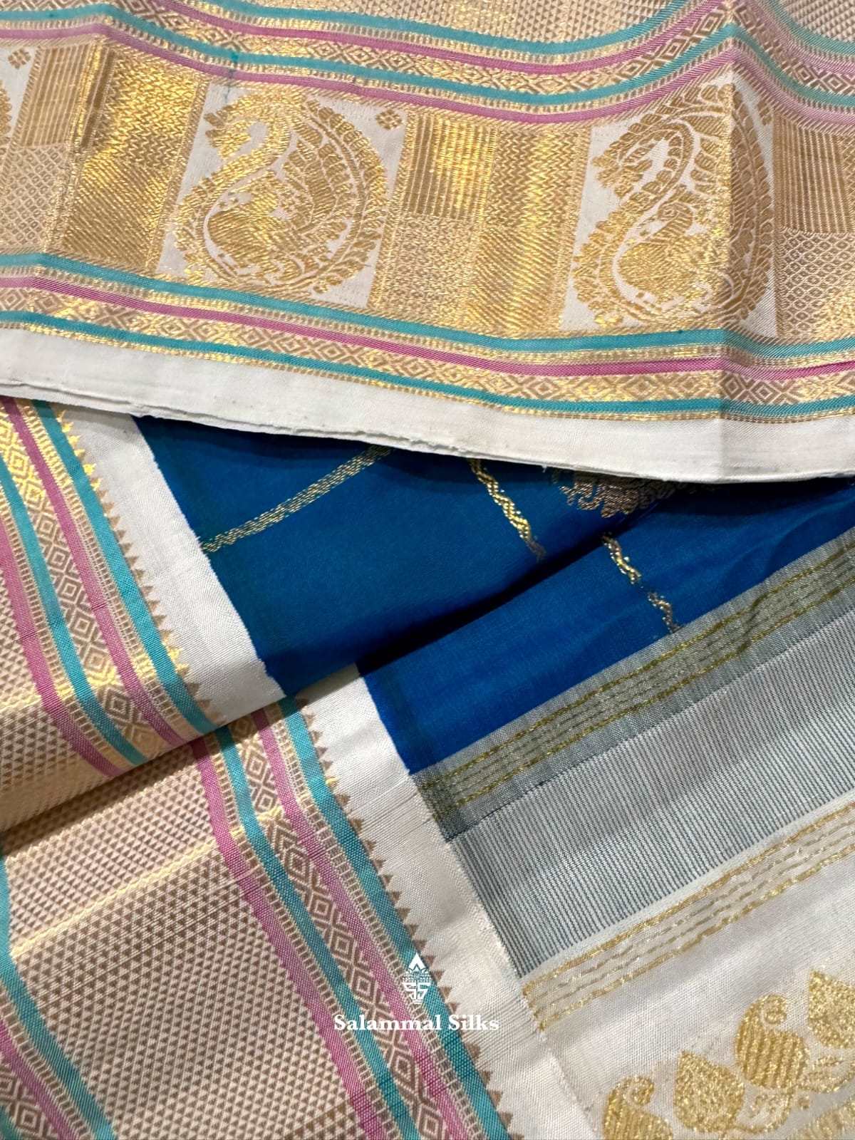 Kanjivaram Peacock Blue Silk Saree With Half White Border