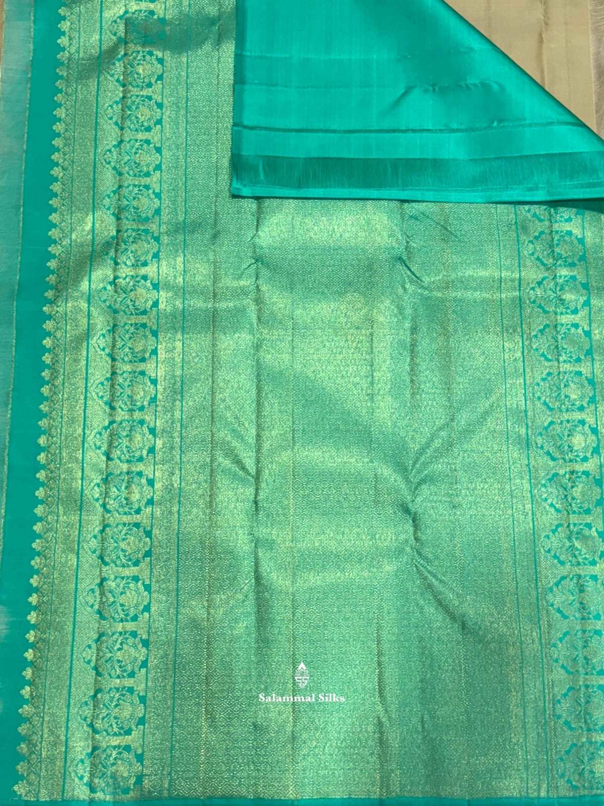 Kanjivaram Pista Green Silk Saree With Turning Border