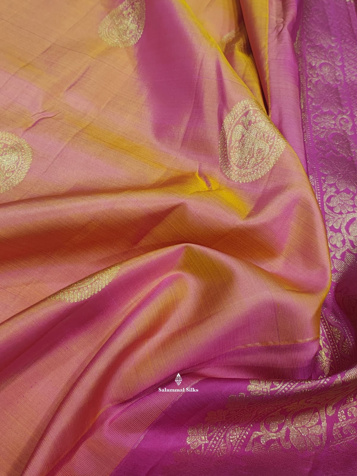 Kanjivaram Pinkkish Peach Pure Silk Saree With Magenta Rose Border