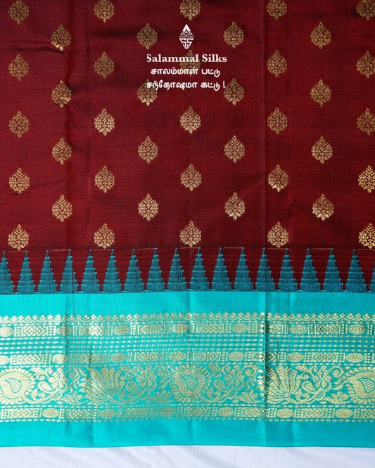 Maroon with Sapphire Green Kanjivaram Silk Saree.