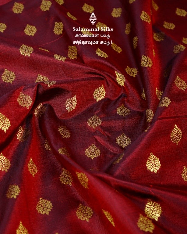 Maroon with Sapphire Green Kanjivaram Silk Saree.