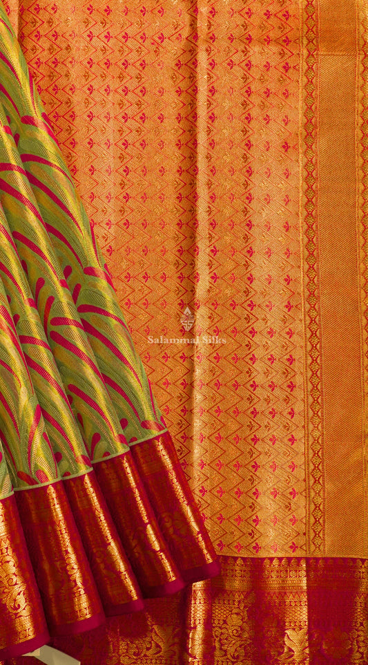 Kanjivaram Elaichi Green Tissue Pure Silk Saree With Magenta Border